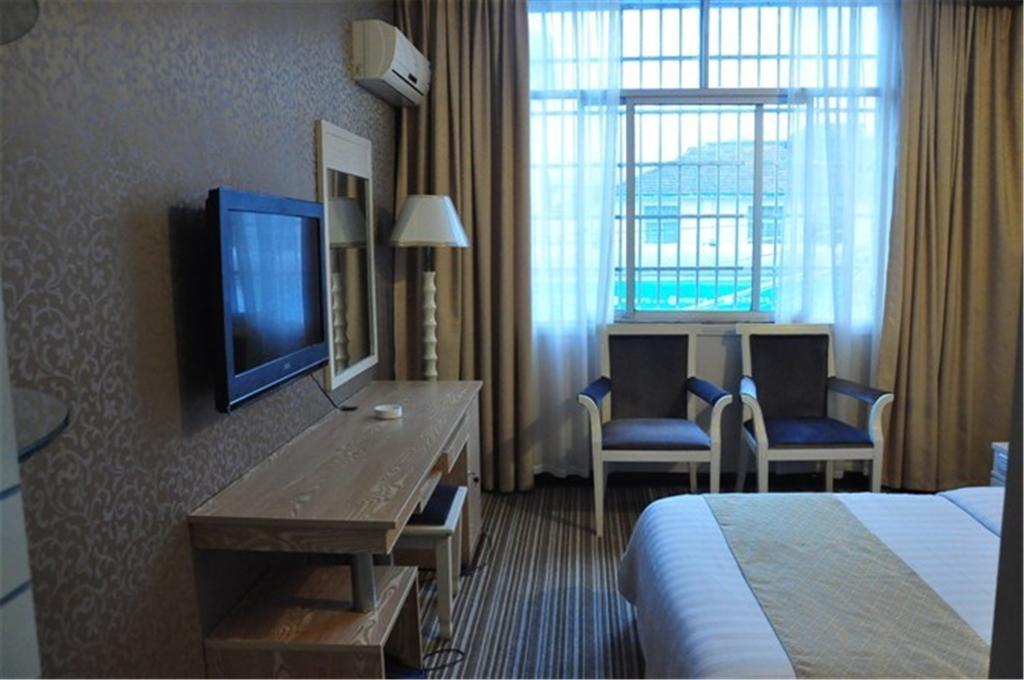 Zhangjiajie Huaya Business Hotel Værelse billede